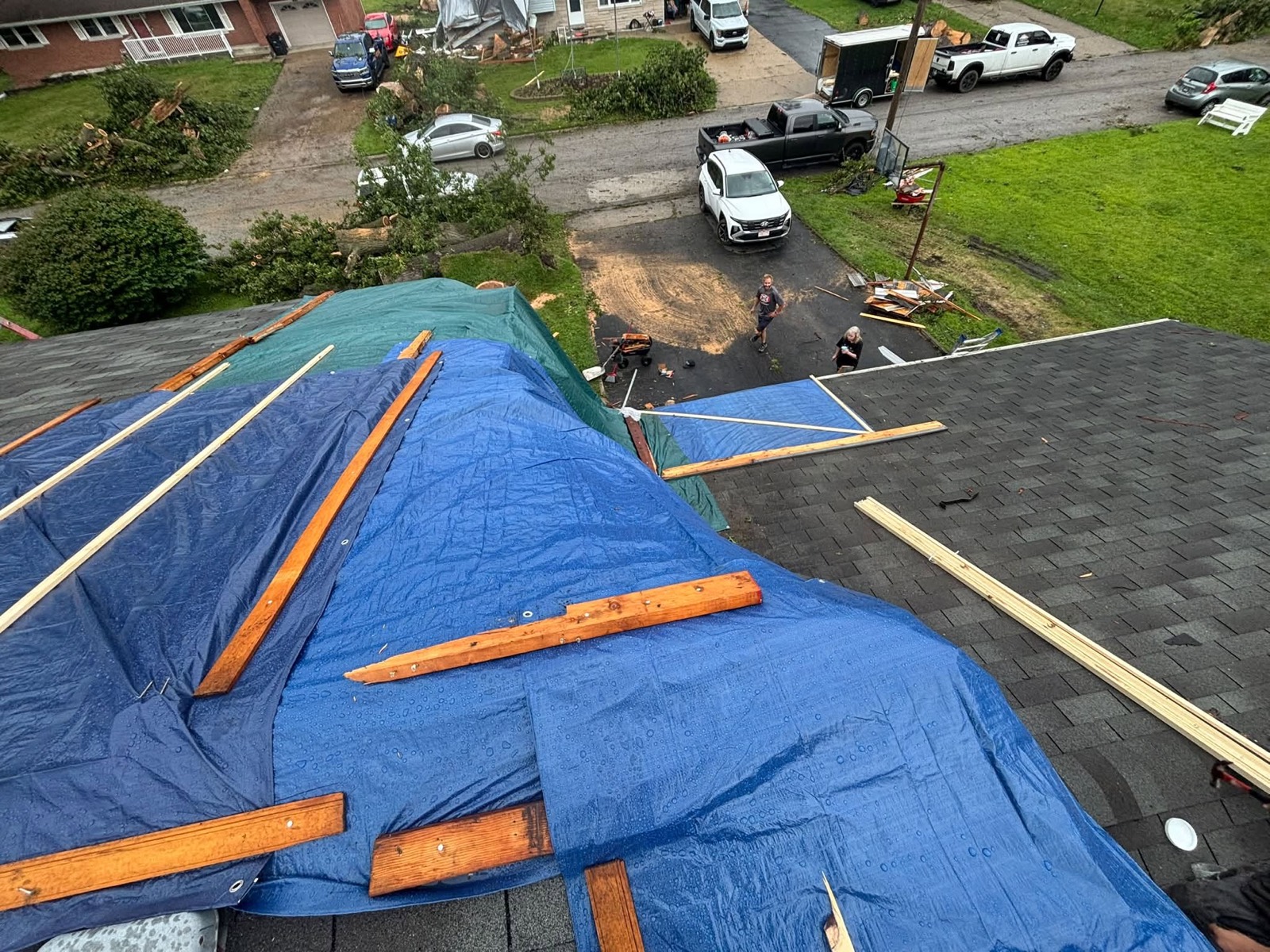 Emergency roof tarping after severe storm in NWI